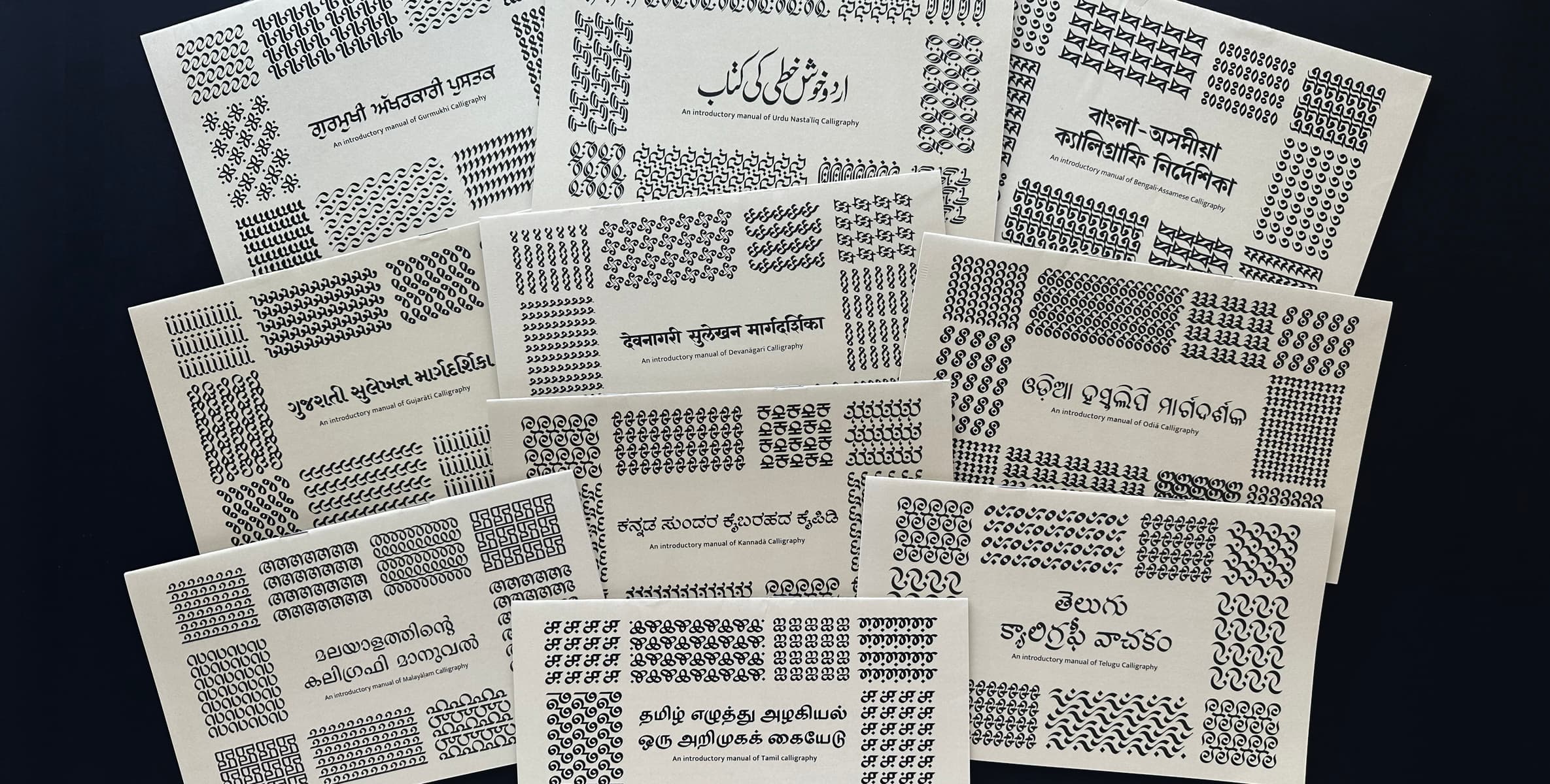 Calligraphy manuals for balbodh calligraphy in 10 Indian scripts